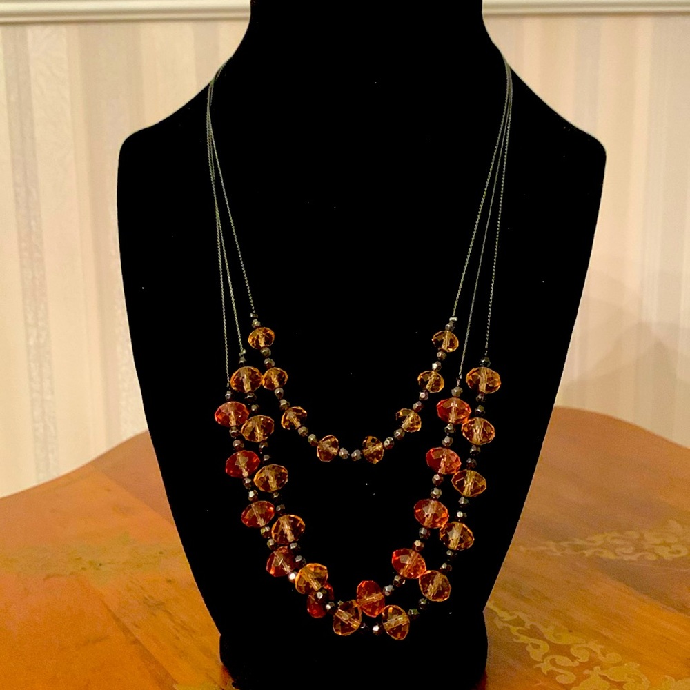 Three tier costume necklace. Oxidized silver with rose and silver beads.